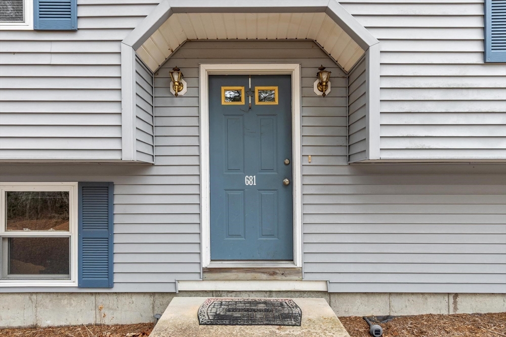 681 Teel Road Winchendon, MA 01475 - Photo 25 of 27 a front view of a house with a garage