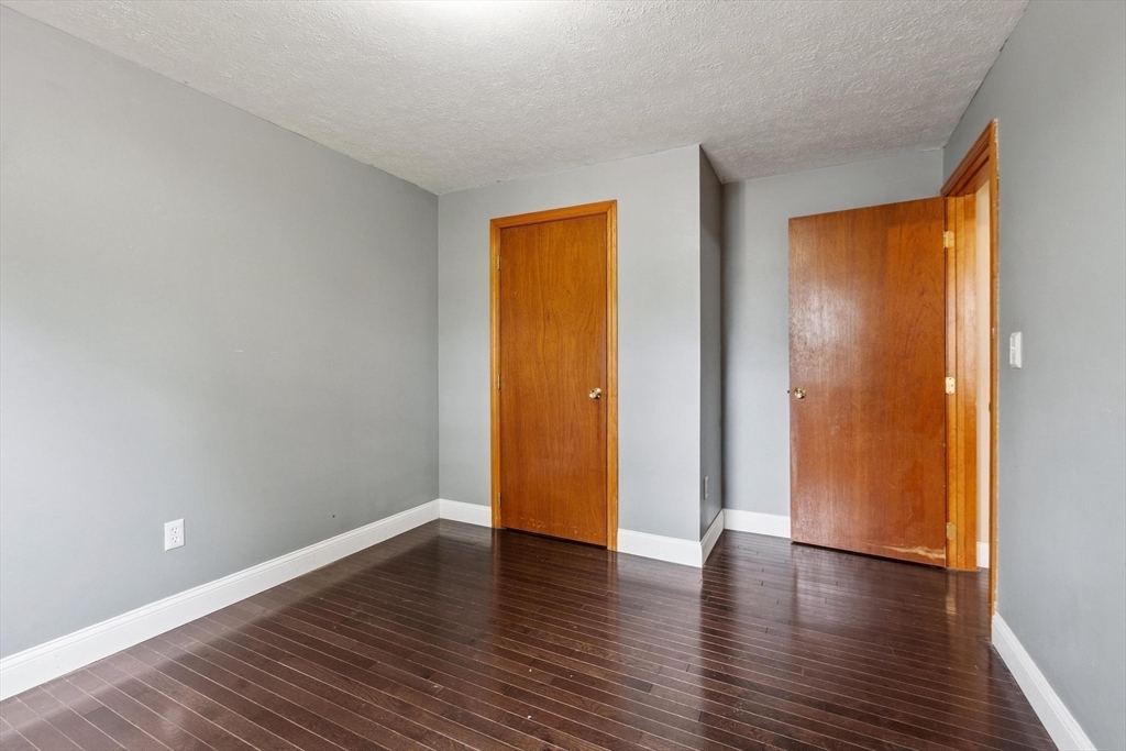 681 Teel Road Winchendon, MA 01475 - Photo 10 of 27 a view of an empty room with wooden floor and a window