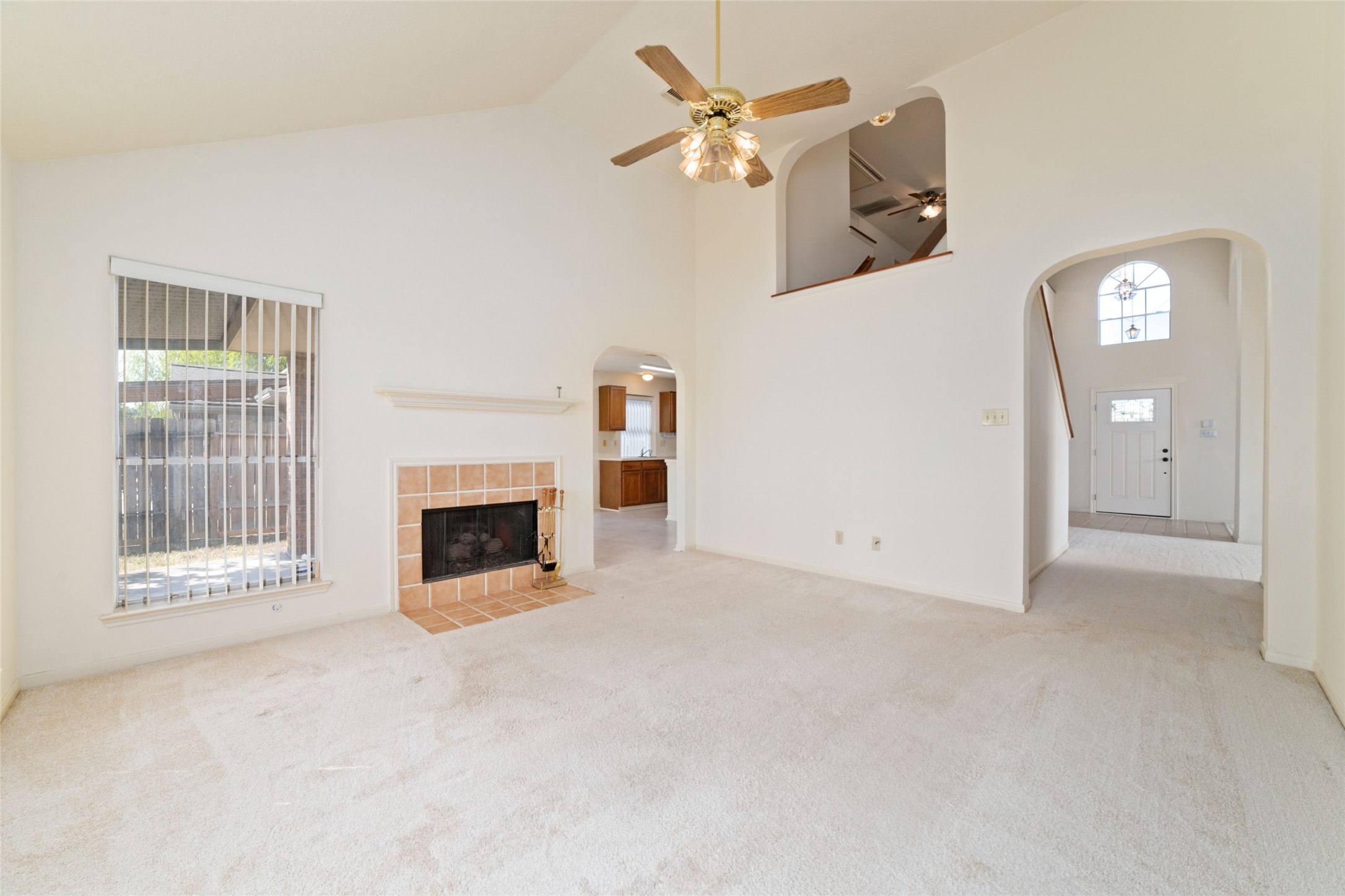 3327 Keygate Drive Spring, TX 77388 - Photo 14 of 37 an empty room with windows and fireplace