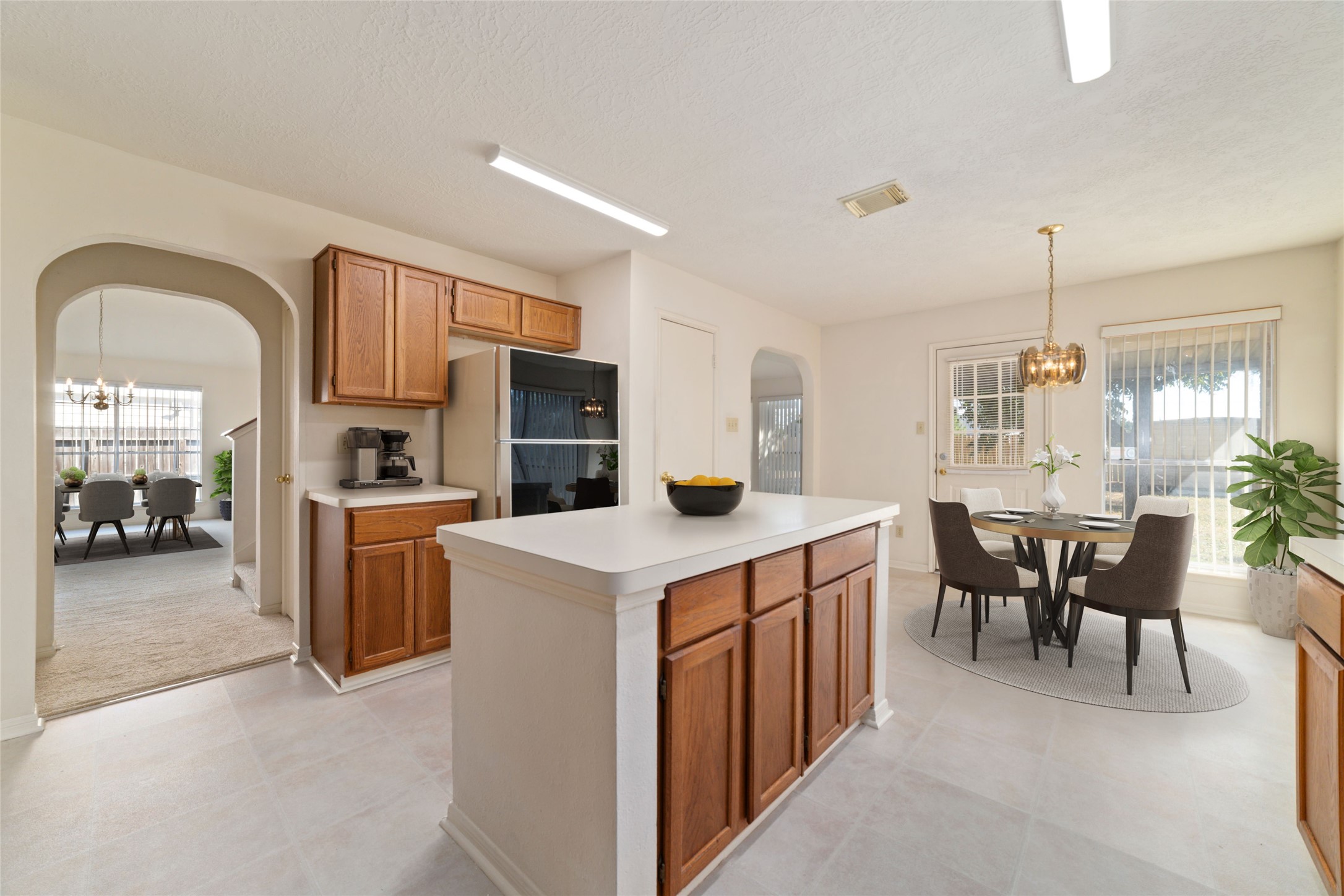 3327 Keygate Drive Spring, TX 77388 - Photo 19 of 37 a kitchen that has a lot of cabinets in it and appliances