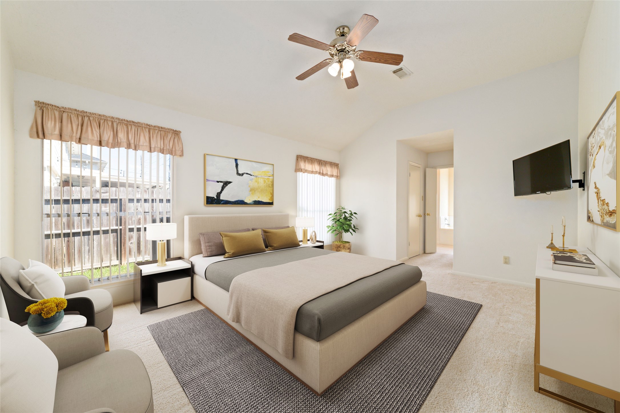 3327 Keygate Drive Spring, TX 77388 - Photo 23 of 37 a bedroom with a large bed a flat screen tv and a couch