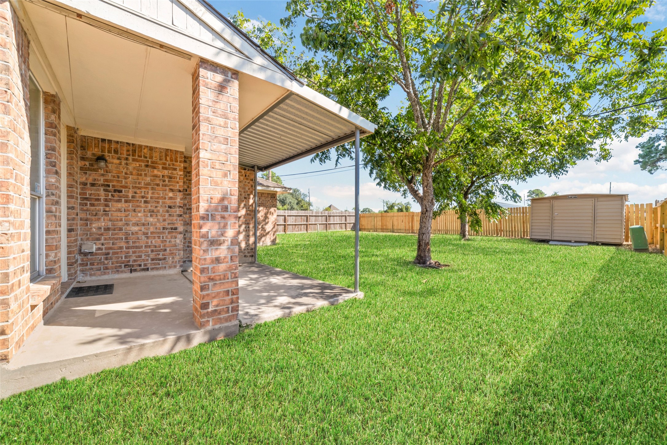 3327 Keygate Drive Spring, TX 77388 - Photo 35 of 37 a view of a house with backyard and a tree