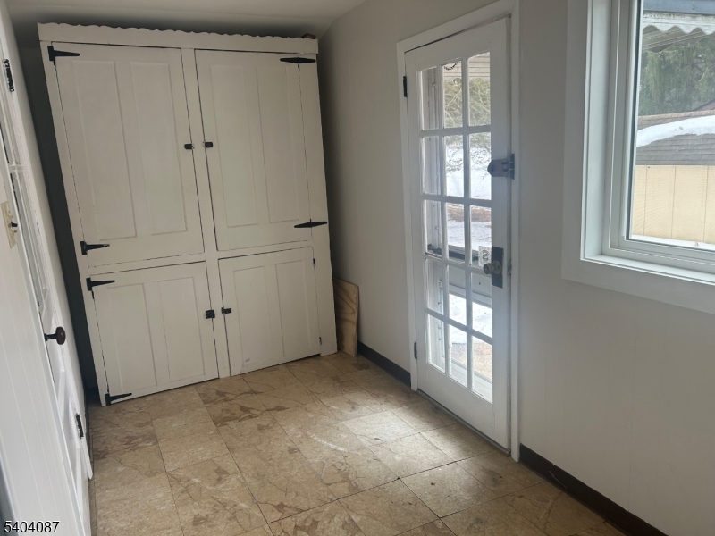 223 Goat Hill Road West Amwell, NJ 08530 - Photo 9 of 17 an empty room with windows