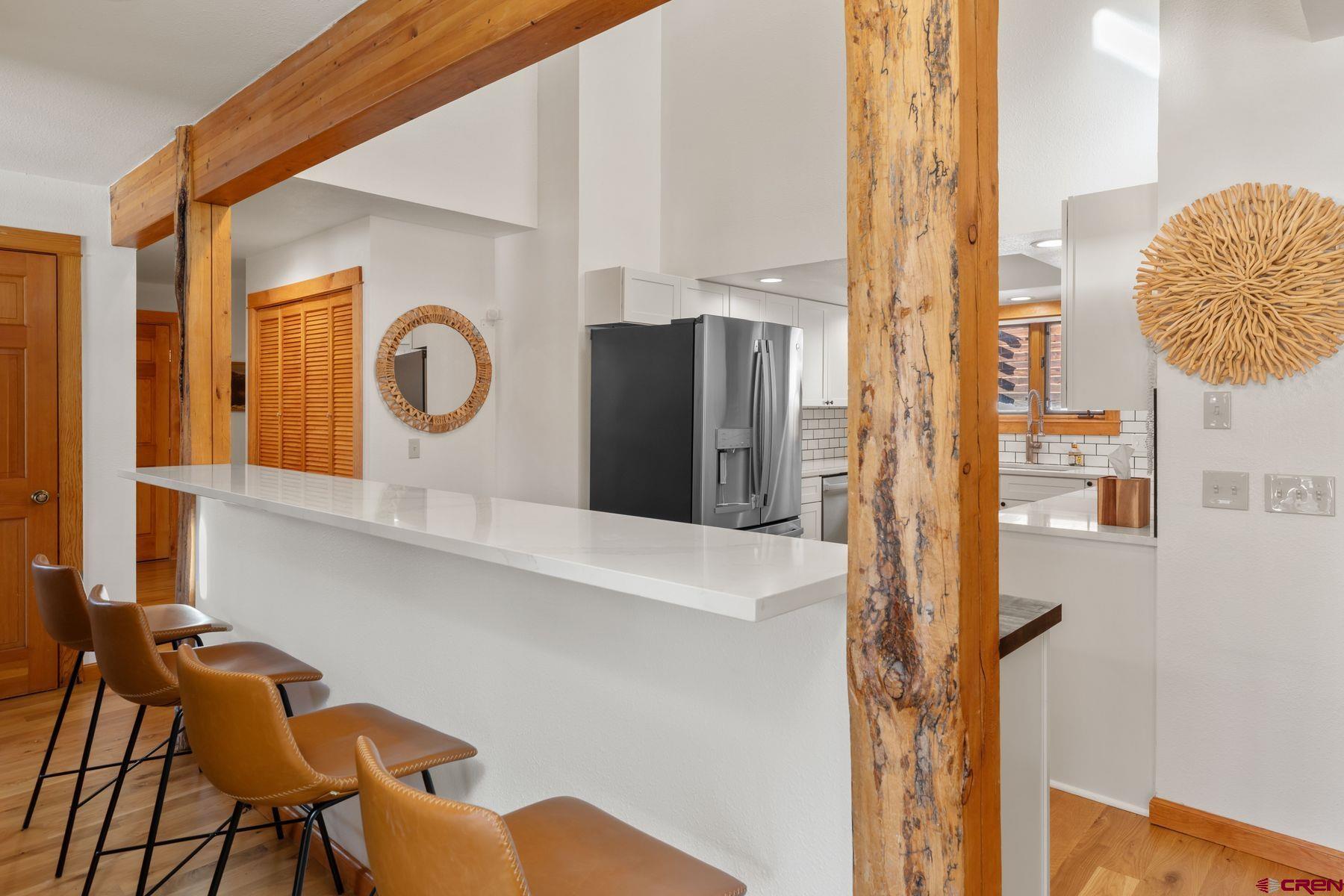 125 County Road 7A Ridgway, CO 81432 - Photo 11 of 40 a view of a kitchen with furniture and a window
