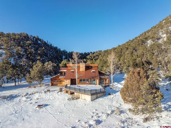 a view of a house with a mountain