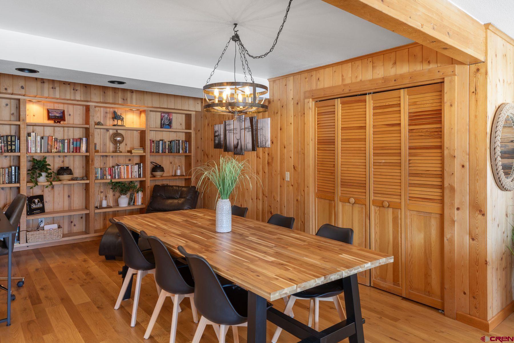 125 County Road 7A Ridgway, CO 81432 - Photo 34 of 40 a view of a dining room with furniture window and wooden floor