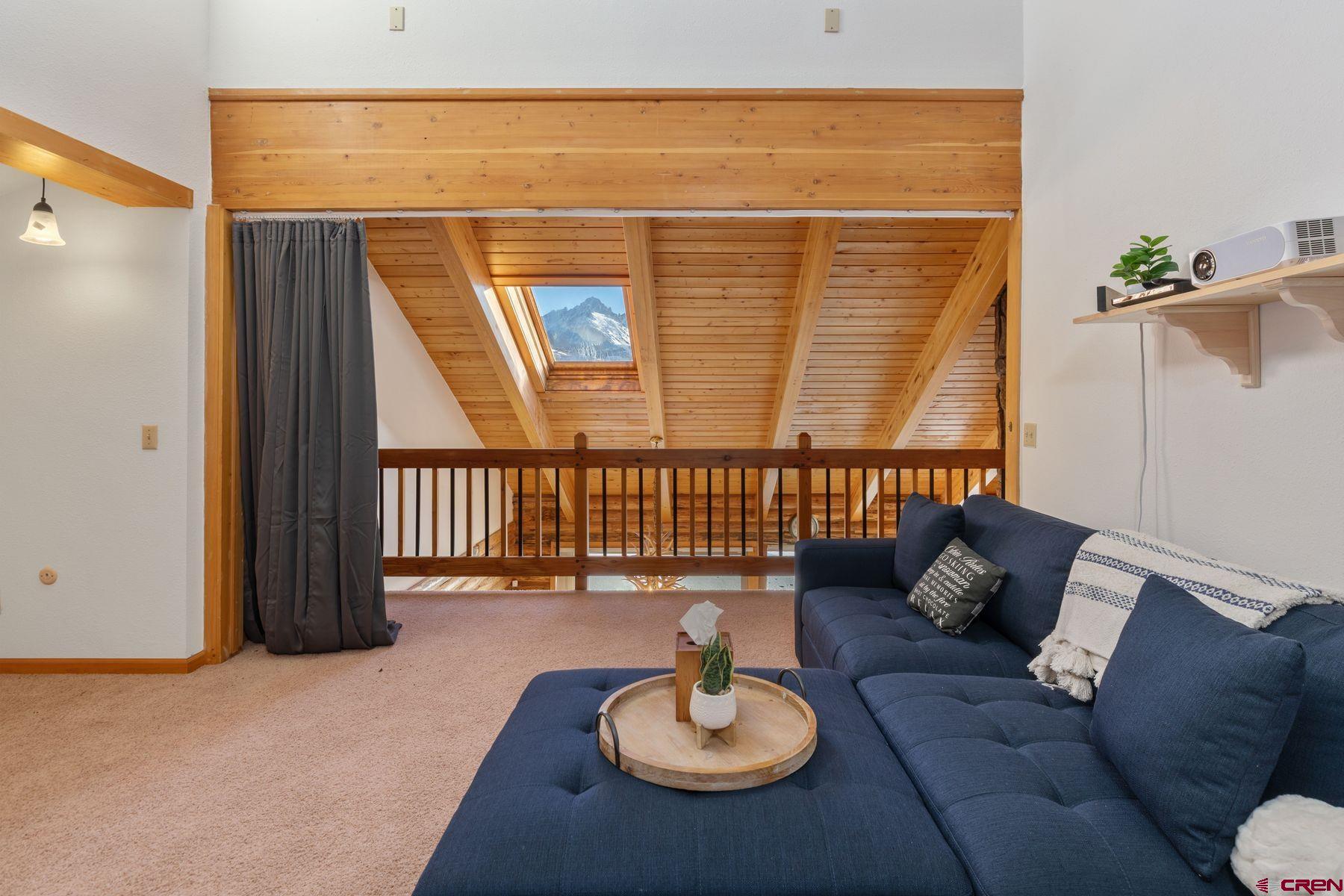 125 County Road 7A Ridgway, CO 81432 - Photo 39 of 40 a balcony with table and chairs