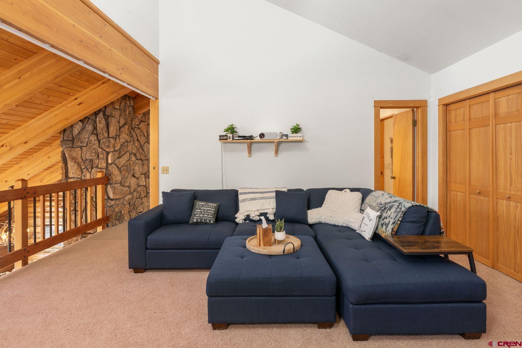 125 County Road 7A Ridgway, CO 81432 - Photo 40 of 40 a living room with furniture and a window