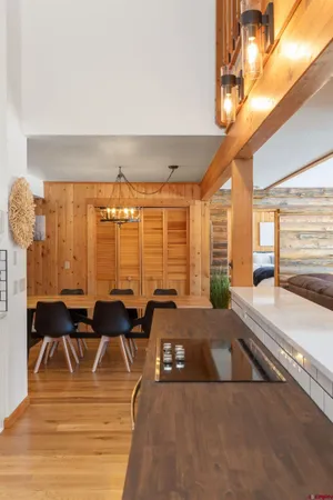 a spacious bedroom with a bed and a window