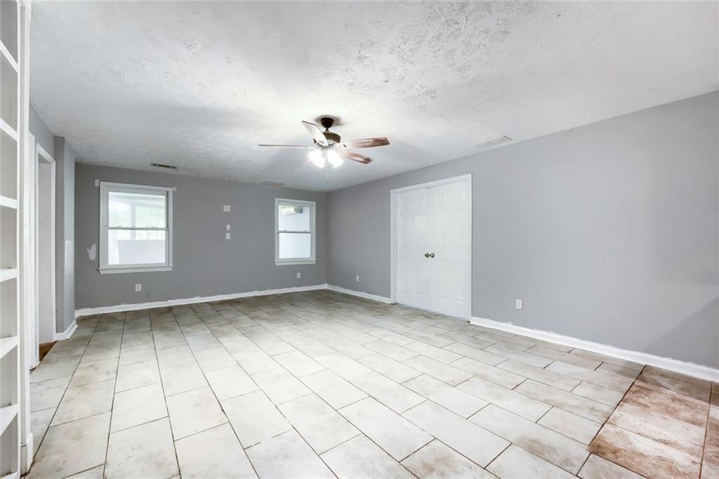 2128 Cluster Lane Grayson, GA 30017 - Photo 22 of 40 a view of an empty room with a window