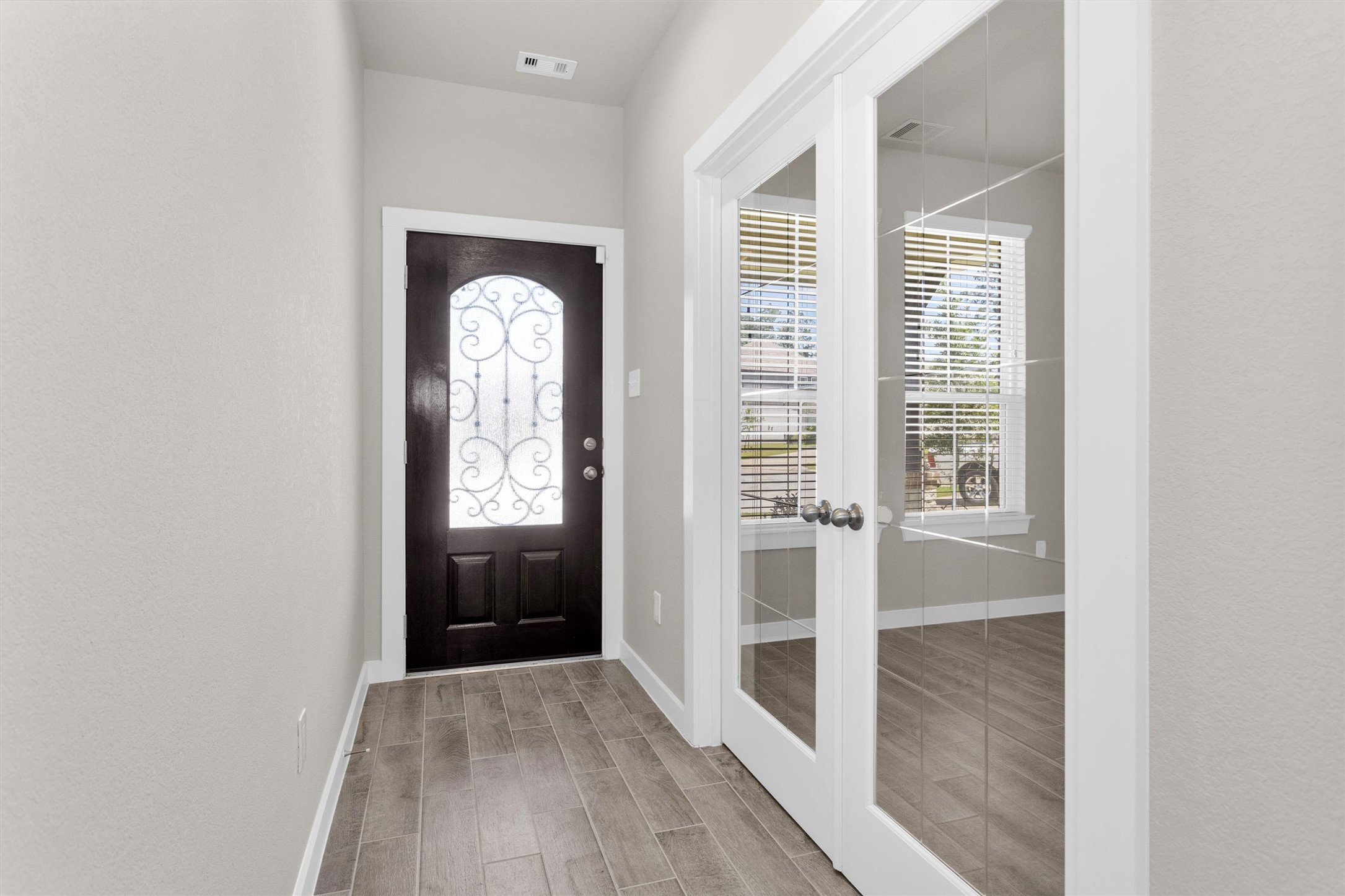 2210 Reed Cave Ln Spring Spring, TX 77386 - Photo 12 of 39 double doors into the office.