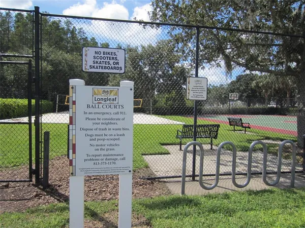 a sign on the side of a park
