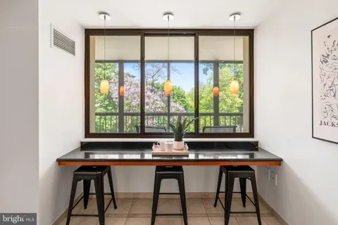 a table and chairs in a room