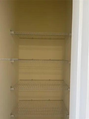 a bathroom with a close shower view