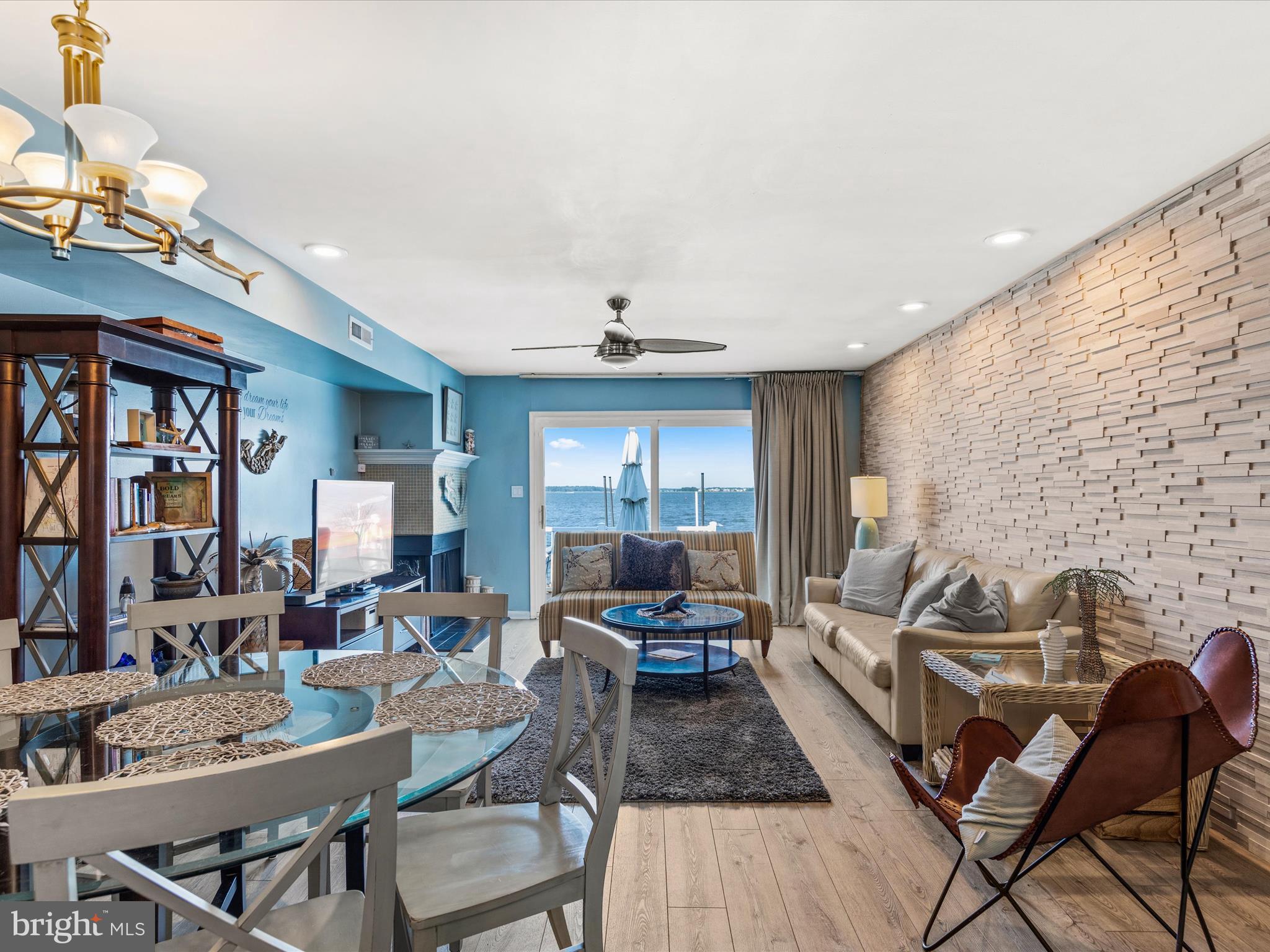 721 Rusty Anchor Road, Unit 22 Ocean City, MD 21842 - Photo 12 of 31 Living room with fireplace and wet bar