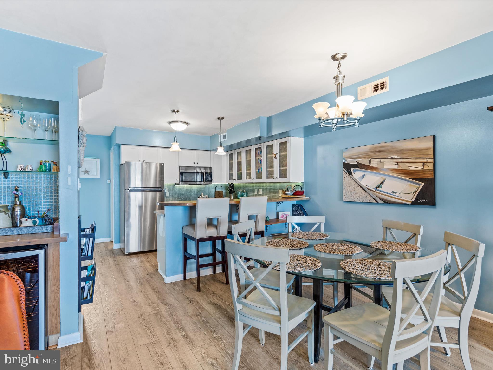 721 Rusty Anchor Road, Unit 22 Ocean City, MD 21842 - Photo 17 of 31 Dining area with wet bar