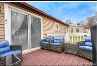 a view of living room filled with furniture and a couch