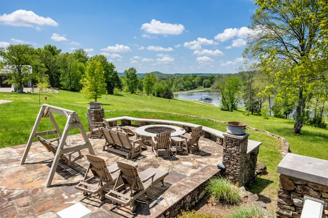 a view of a lake with a yard