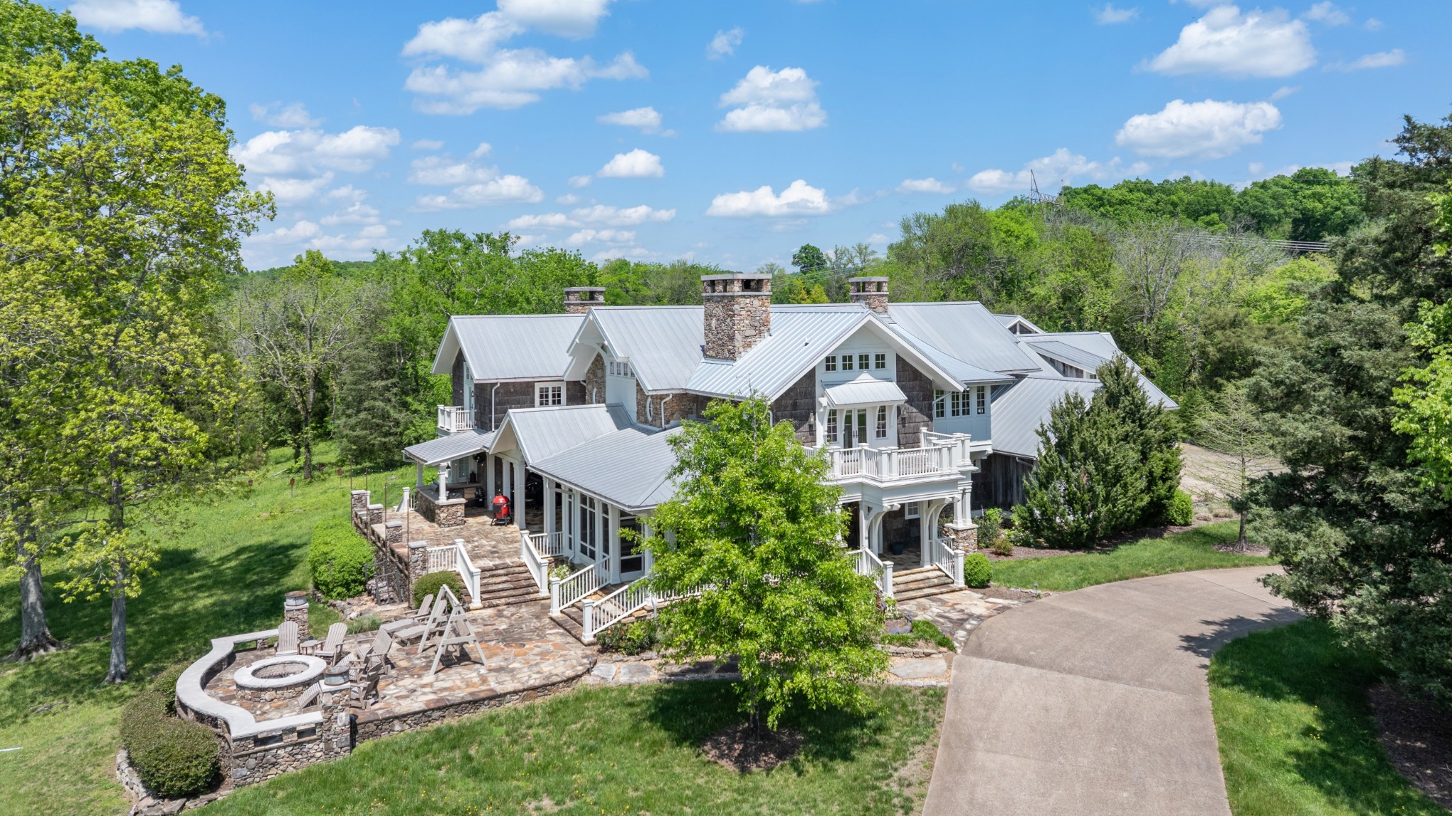 605 Red Oak Road Petersburg, TN 37144 - Photo 3 of 98 a front view of a house with a garden and a tree