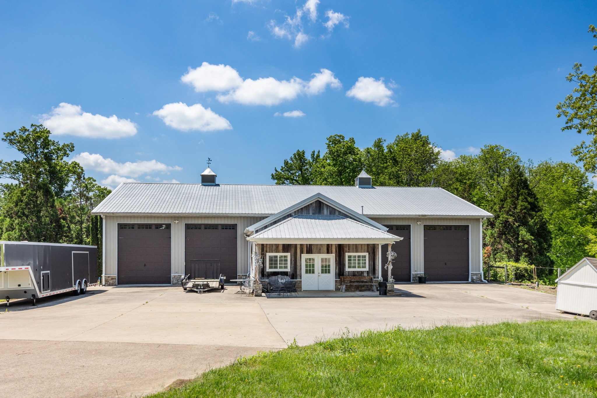 605 Red Oak Road Petersburg, TN 37144 - Photo 64 of 98 a front view of a house with a garden and yard