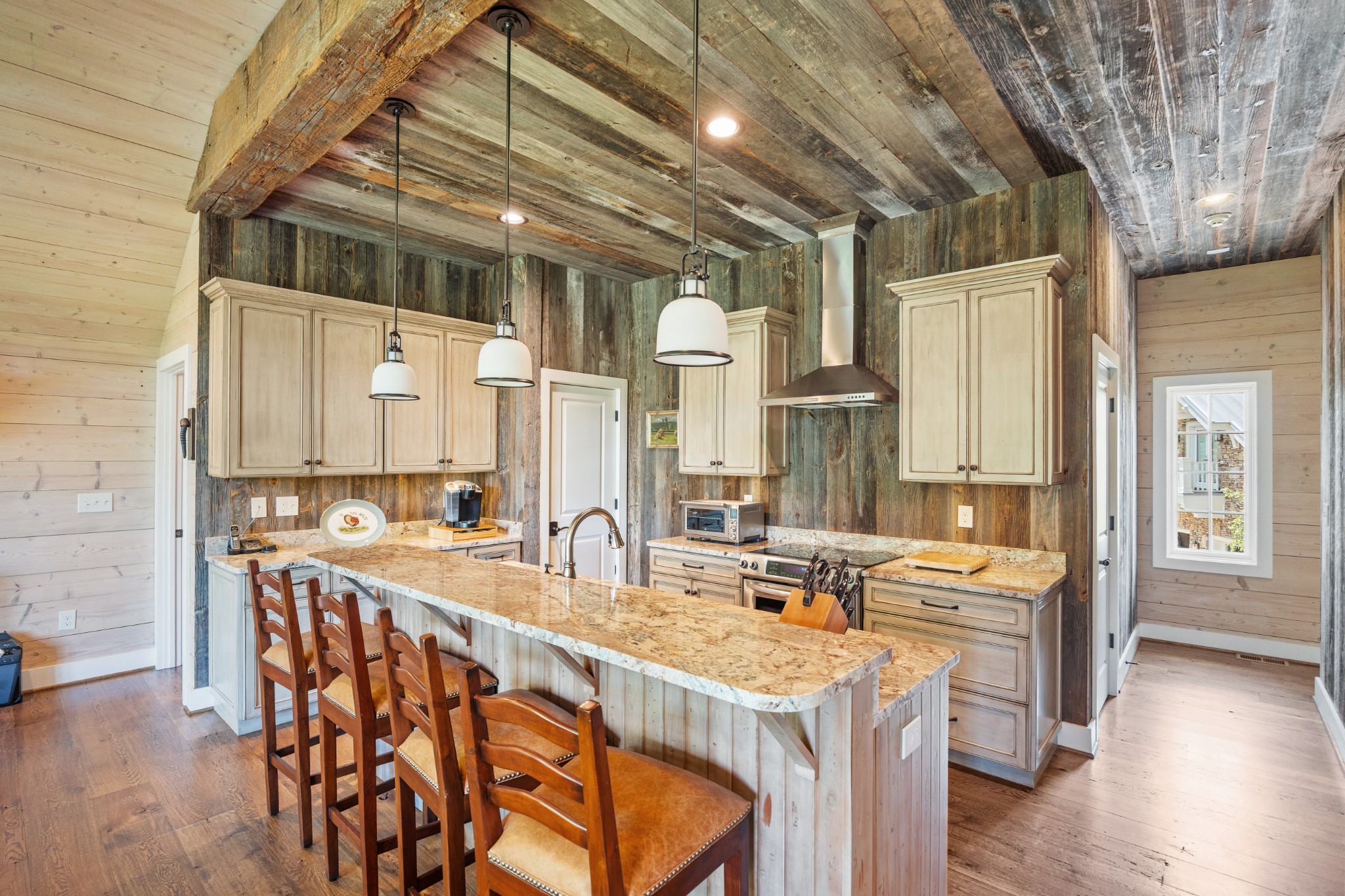 605 Red Oak Road Petersburg, TN 37144 - Photo 73 of 98 a dining hall with stainless steel appliances kitchen island granite countertop a sink and cabinets