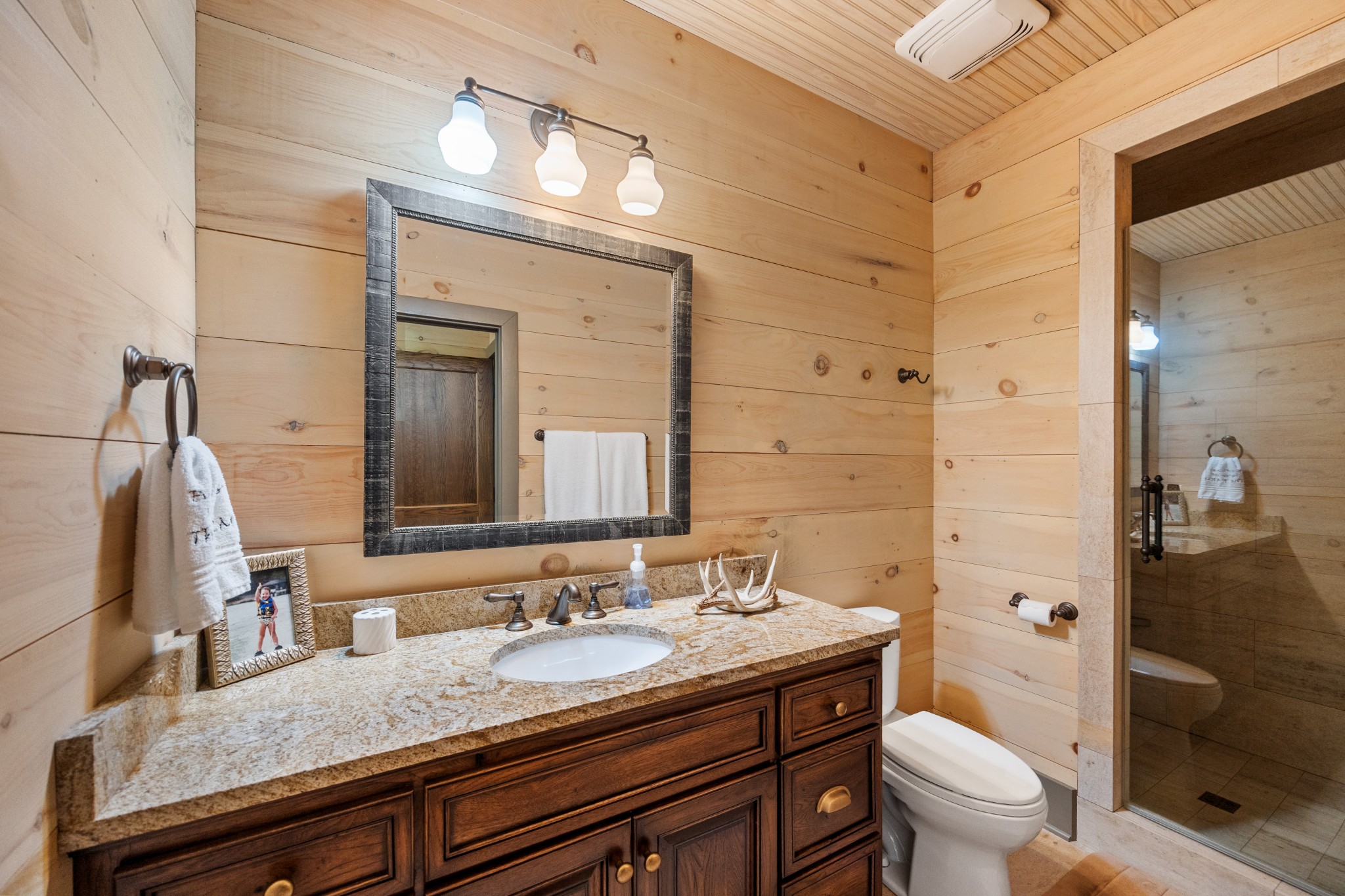 605 Red Oak Road Petersburg, TN 37144 - Photo 86 of 98 a bathroom with a granite countertop toilet sink and mirror