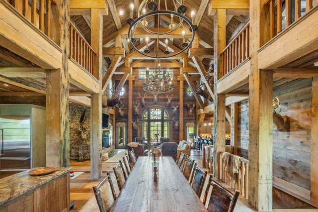 a kitchen with lots of counter top space and dining table