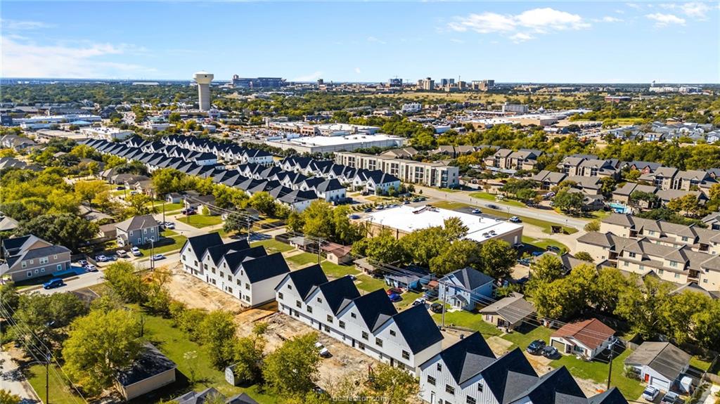 an aerial view of a city with lots of residential buildings