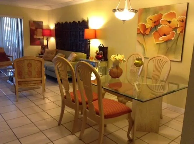 a bed room with a chair and gym equipment