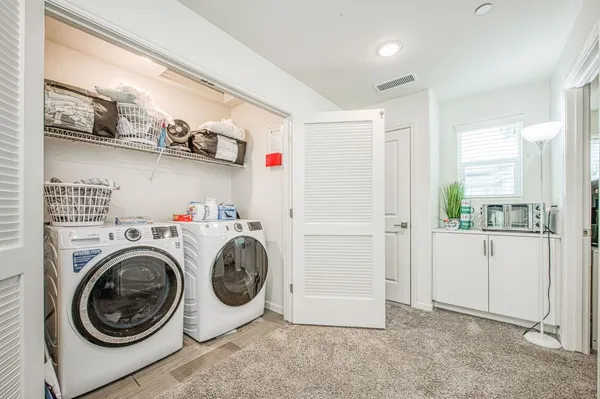 a view of washer and dryer in a room