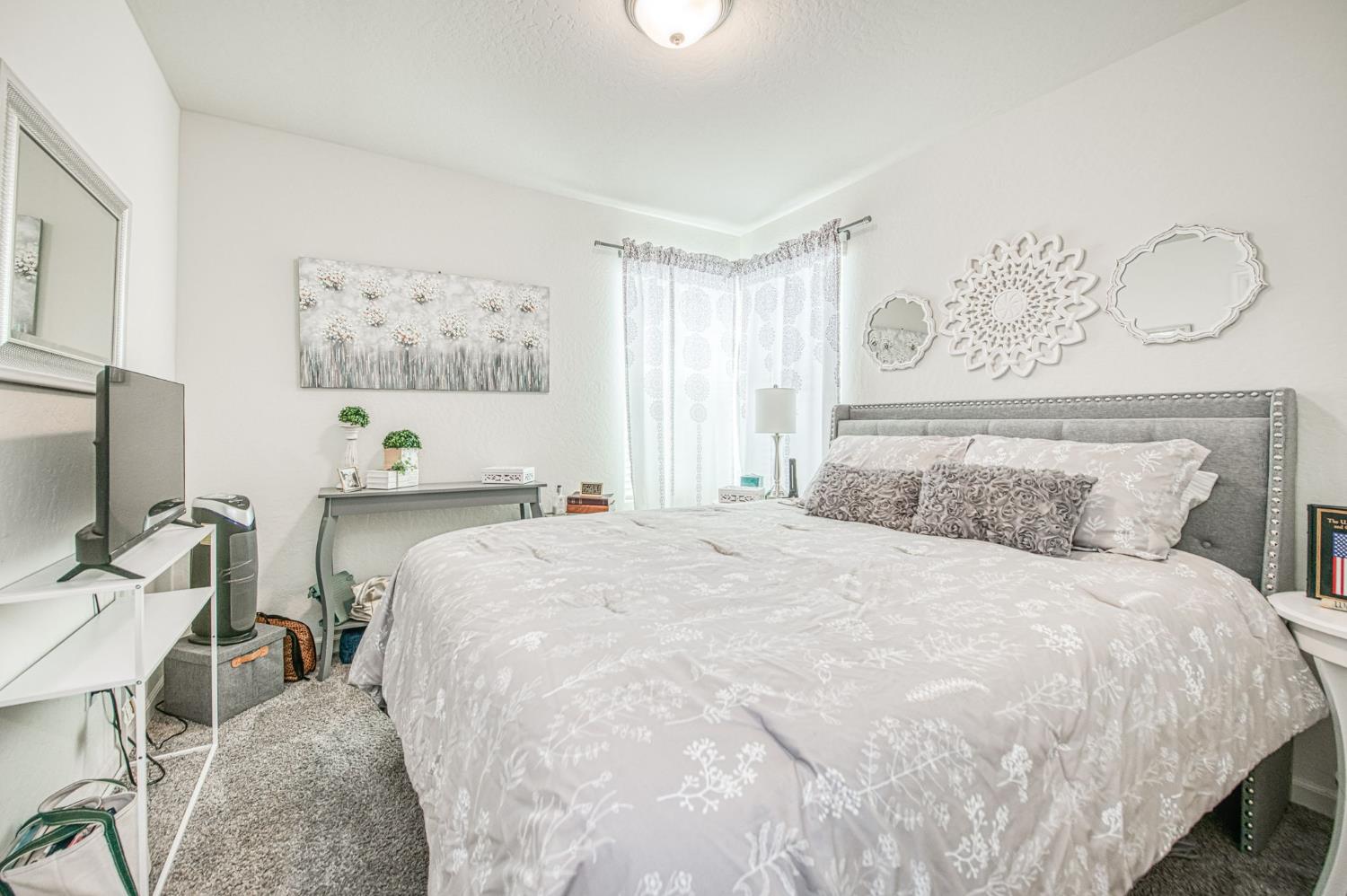 2053 North Ralph Lane Clovis, CA 93619 - Photo 21 of 31 a large white bed in a white room