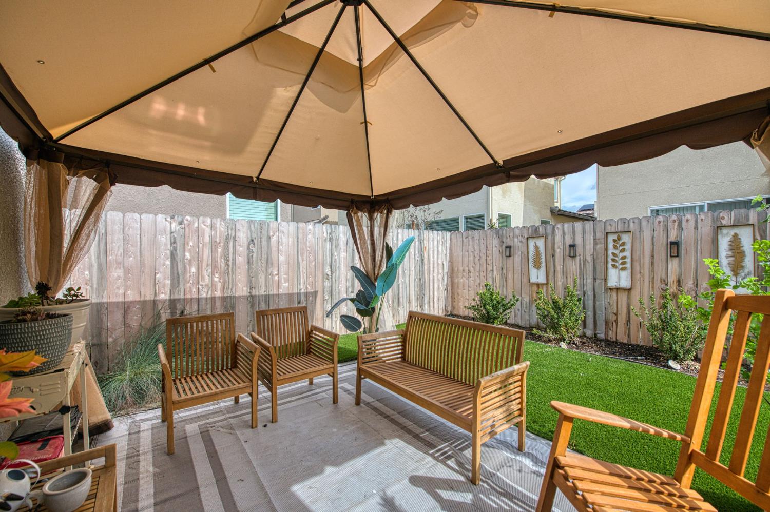 2053 North Ralph Lane Clovis, CA 93619 - Photo 26 of 31 a balcony with furniture and a garden