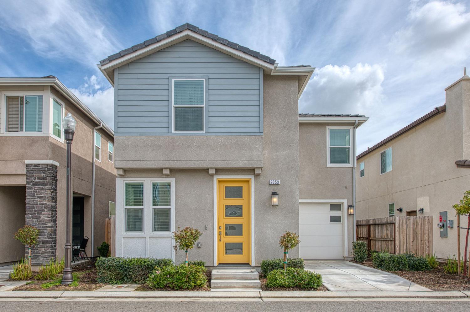 2053 North Ralph Lane Clovis, CA 93619 - Photo 5 of 31 a front view of a house