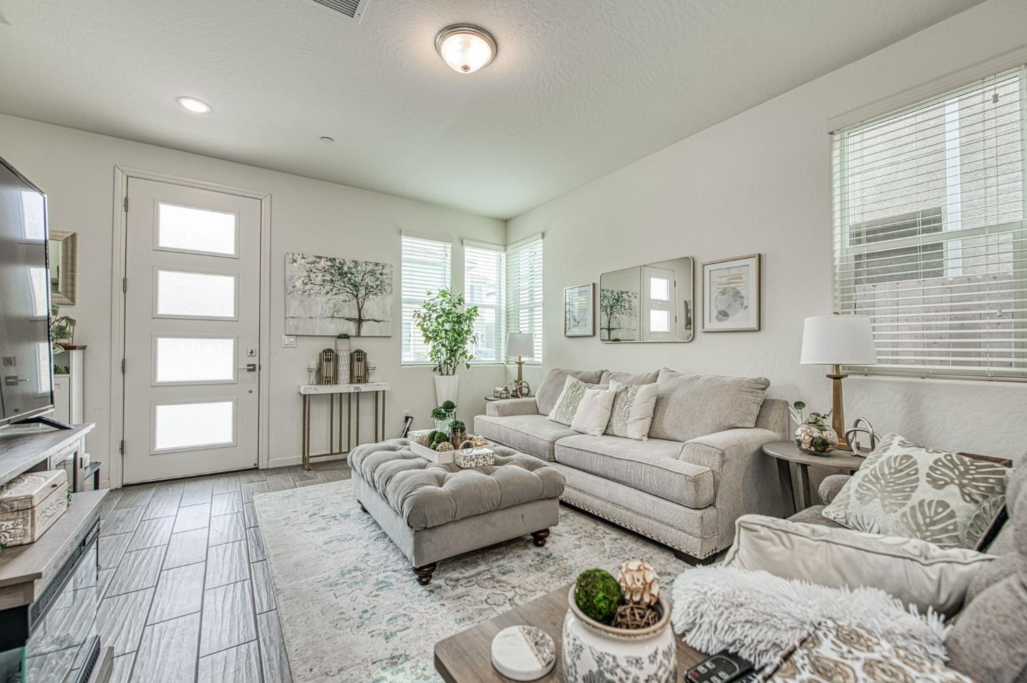 2053 North Ralph Lane Clovis, CA 93619 - Photo 8 of 31 a living room with furniture and a table