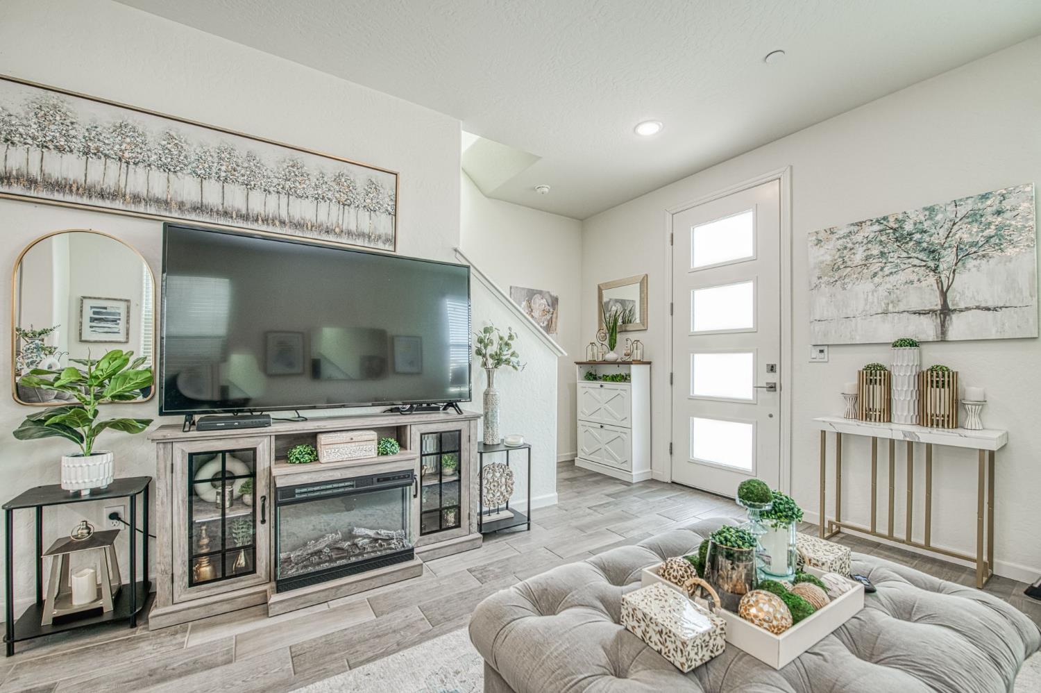 2053 North Ralph Lane Clovis, CA 93619 - Photo 9 of 31 a living room with furniture and a flat screen tv