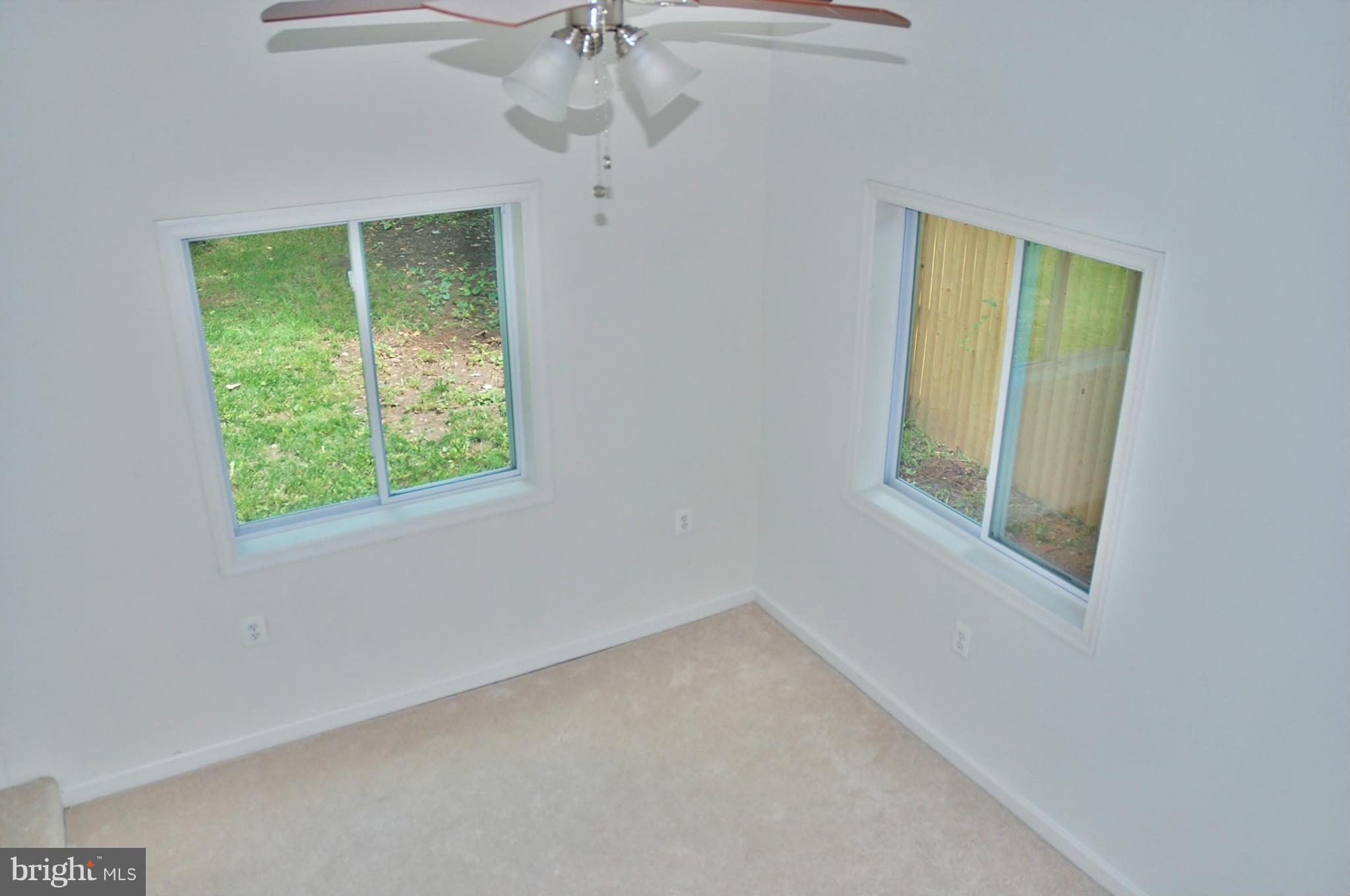 211 Thistle Drive Silver Spring, MD 20901 - Photo 11 of 23 an empty room with a window
