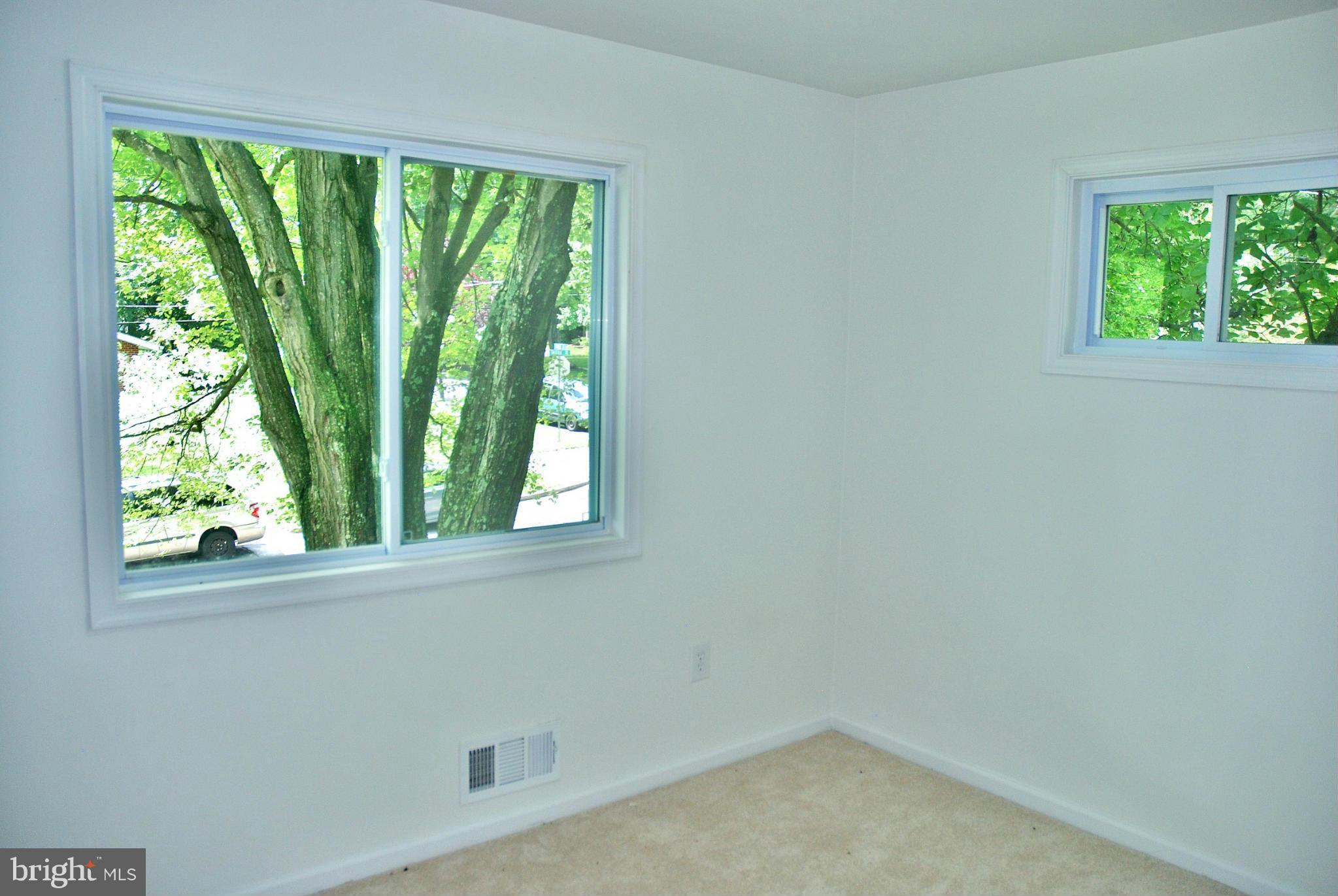 211 Thistle Drive Silver Spring, MD 20901 - Photo 12 of 23 an empty room with a window