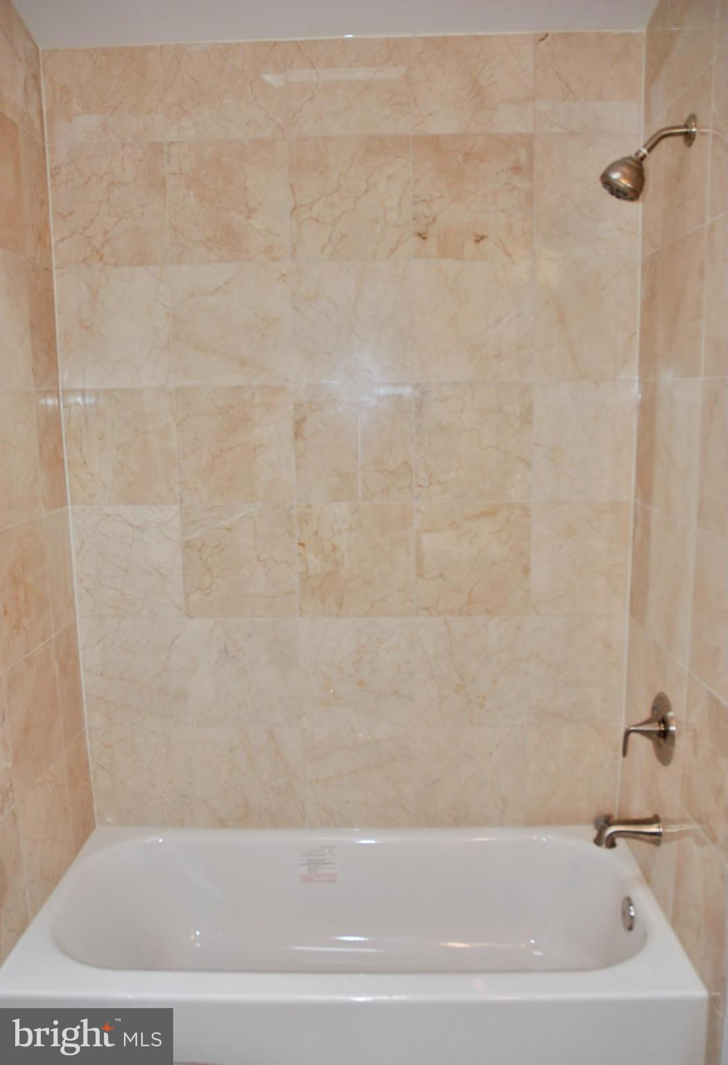 211 Thistle Drive Silver Spring, MD 20901 - Photo 15 of 23 a bathroom with a bathtub