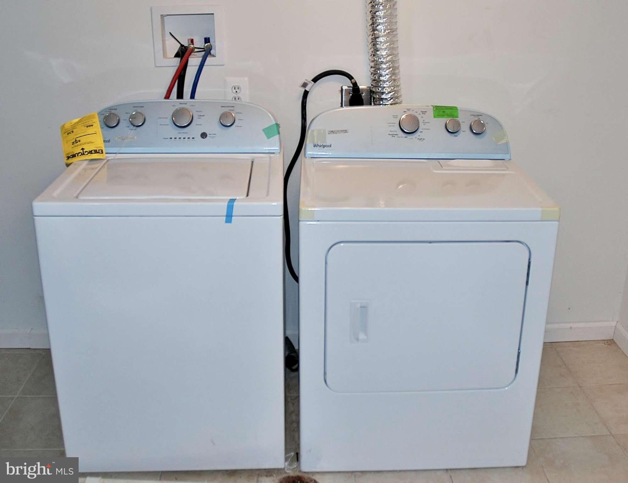 211 Thistle Drive Silver Spring, MD 20901 - Photo 17 of 23 a utility room with dryer and washer