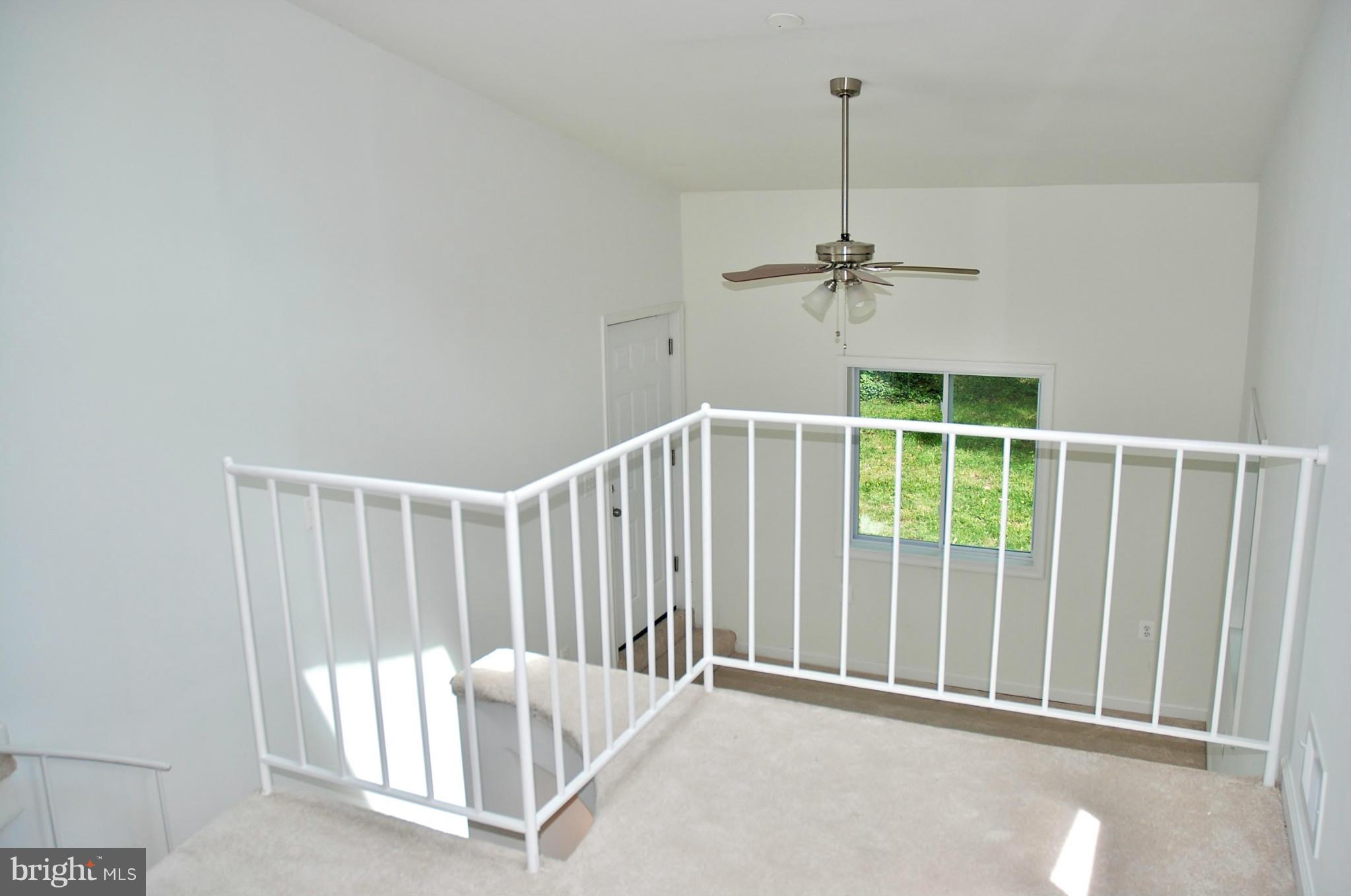 211 Thistle Drive Silver Spring, MD 20901 - Photo 21 of 23 a view of a room with a ceiling fan