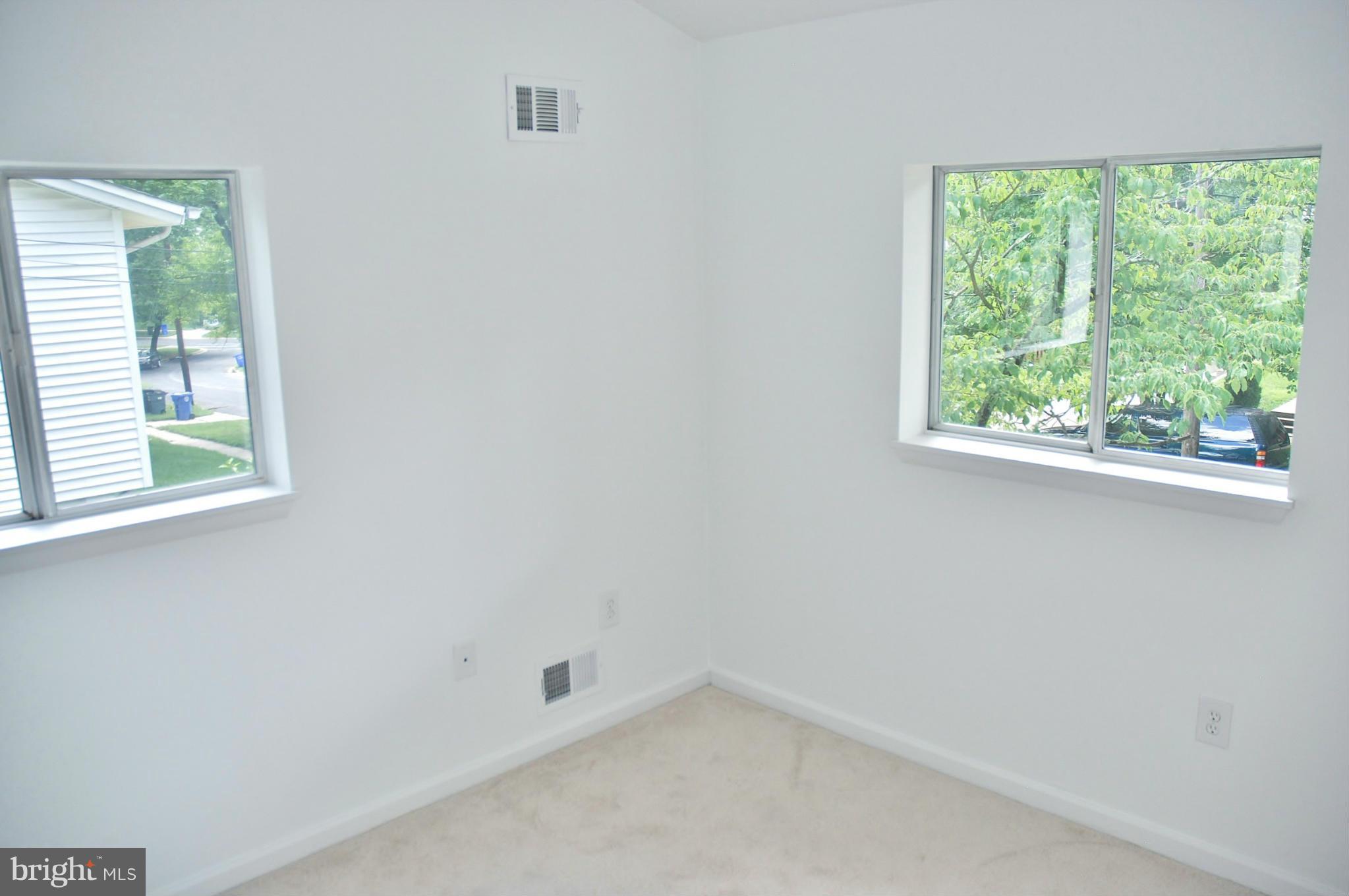 211 Thistle Drive Silver Spring, MD 20901 - Photo 10 of 23 an empty room with a window