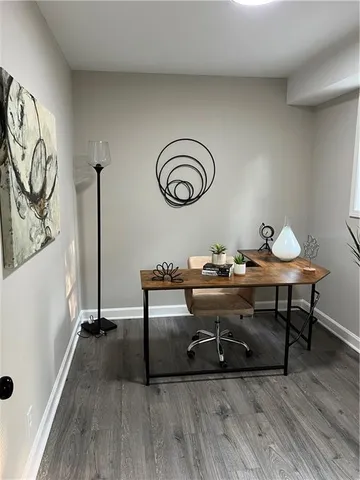 a bathroom with a sink a toilet and a shower