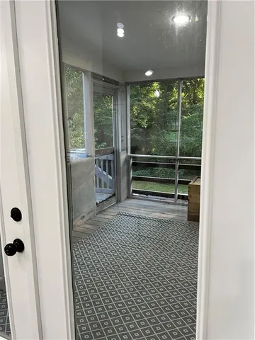 a view of outdoor space with playground and green space