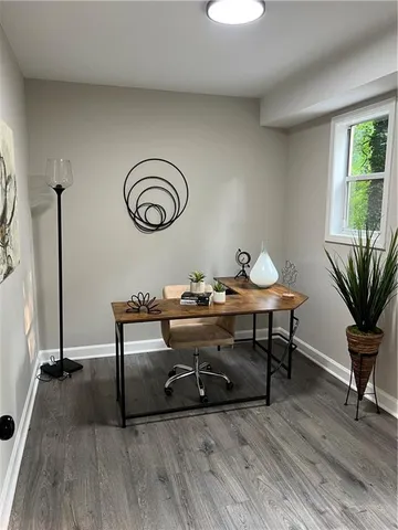 a front view of house with yard and seating area