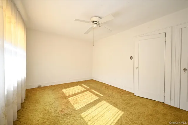 a view of a room with a window