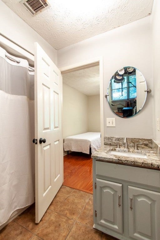 1328 Owens Road Auburn, AL 36830 - Photo 19 of 22 Shared bath for bedrooms 2 & 3.