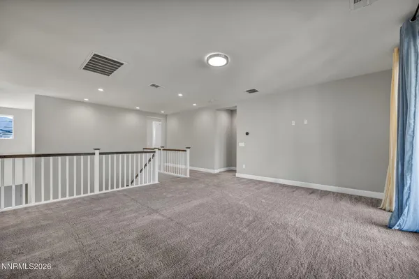 a view of a room with rack on the wall