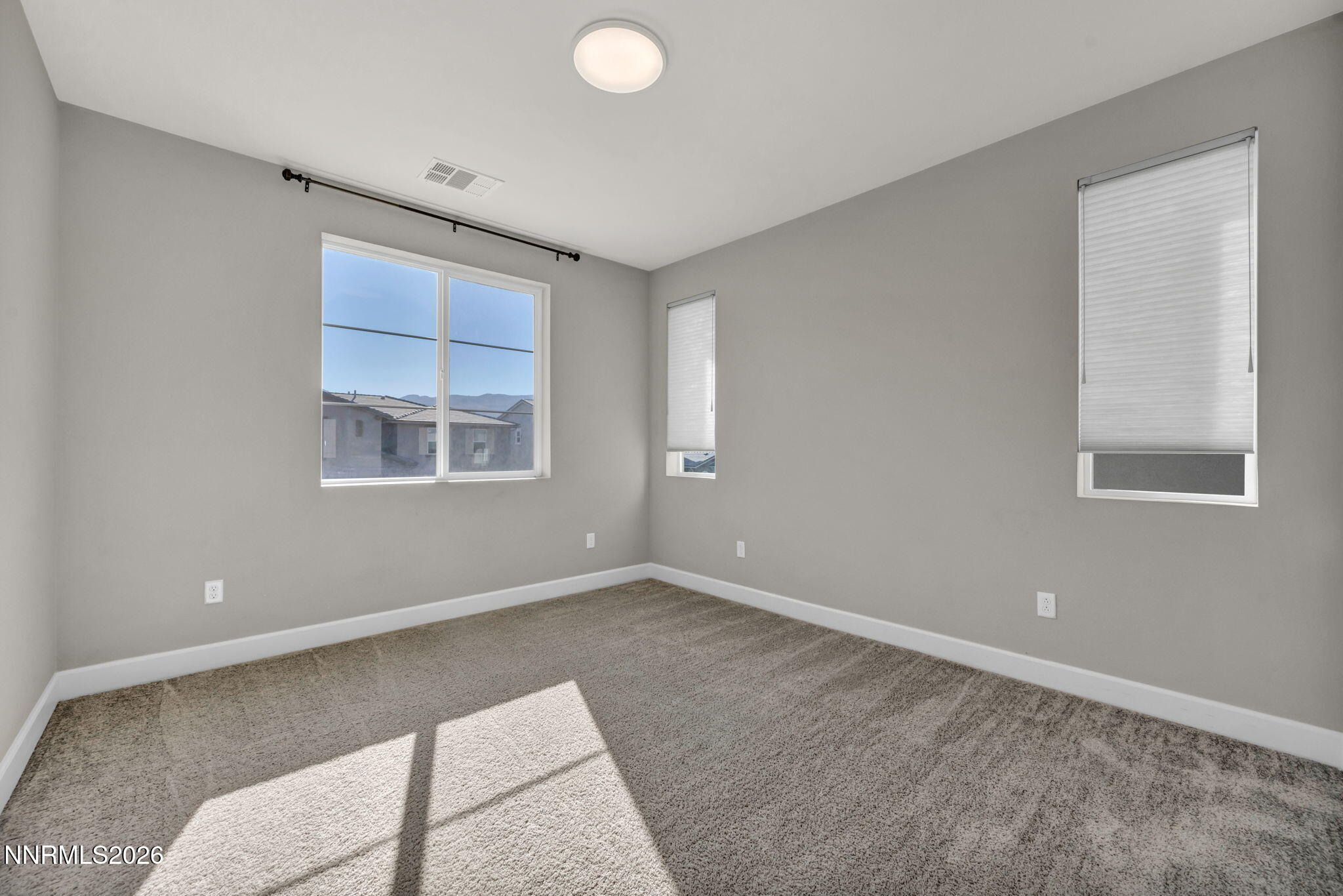 9267 Blue Basin Trail Reno, NV 89521 - Photo 47 of 95 a view of an empty room with a window
