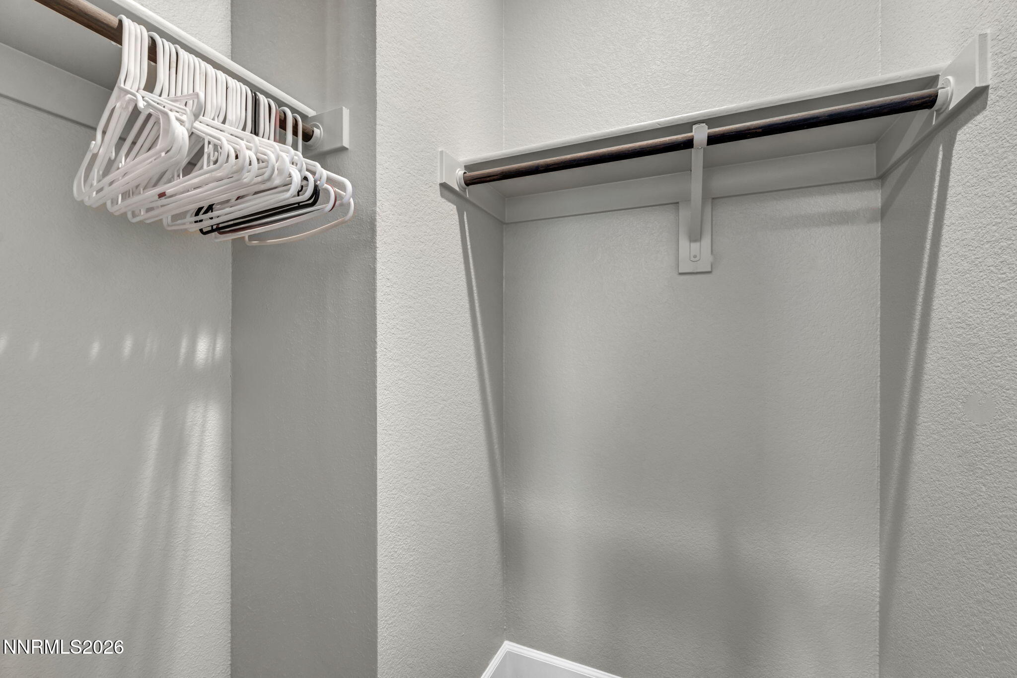 9267 Blue Basin Trail Reno, NV 89521 - Photo 50 of 95 a view of a room with rack on the wall