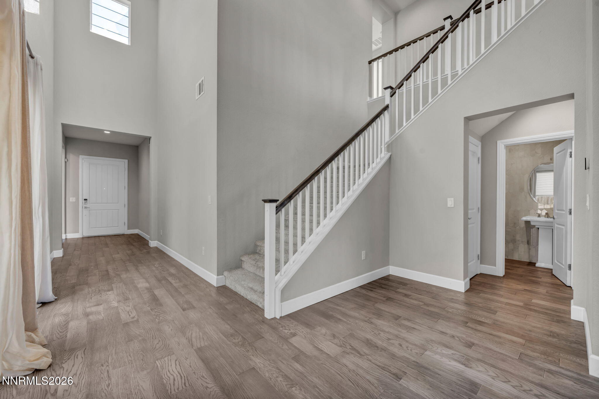 9267 Blue Basin Trail Reno, NV 89521 - Photo 5 of 95 a view of entryway with wooden floor